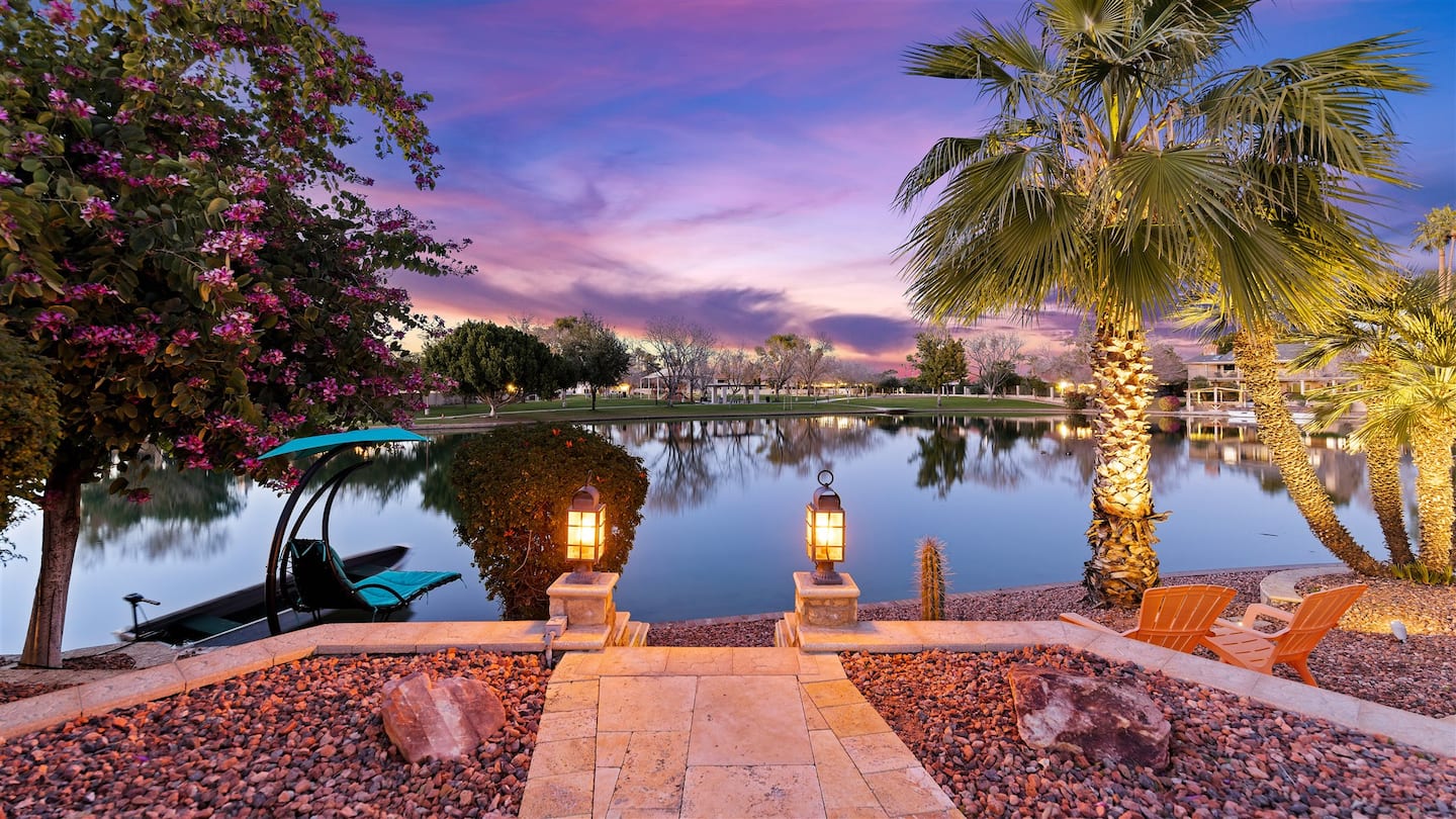 H2O Sanctuary lakefront sunset view with pool and lake in Mesa, Arizona