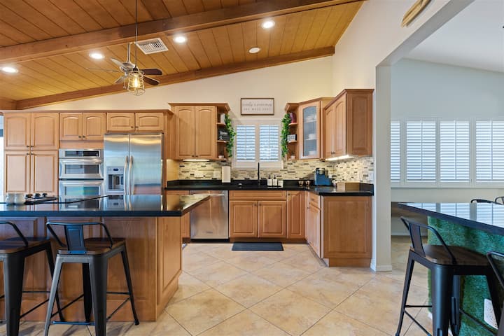 H2O Sanctuary kitchen — stainless appliances and granite counters