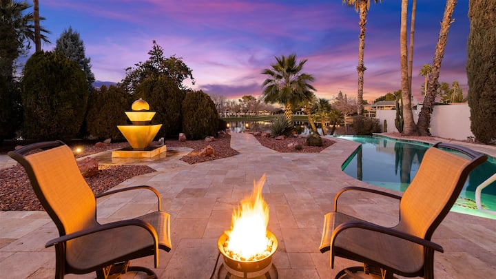 H2O Sanctuary fire pit and outdoor seating at dusk