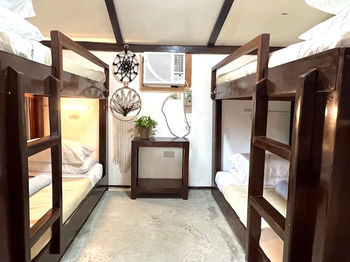 Another bedroom of Beach Hut #2.   Each bunk bed has light source and electric outlets.