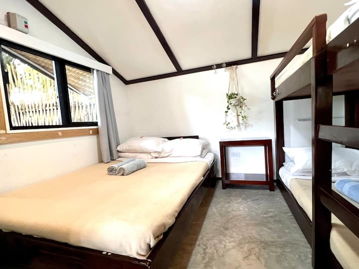 This is another bedroom in Beach Hut # 2.  The window faces the sea.