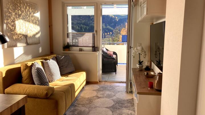 Living area  and door to balcony
