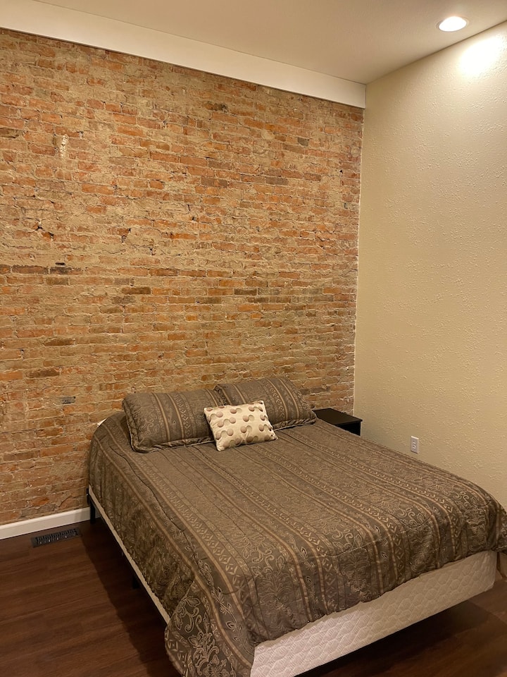 The two newly added bedrooms feel roomy and have a great, warm feel with the natural brick and 10+ foot ceilings.