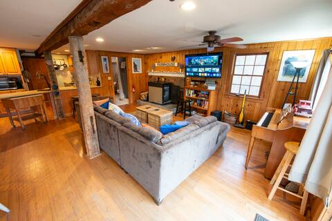 Main St home with 15 acre backyard on the river