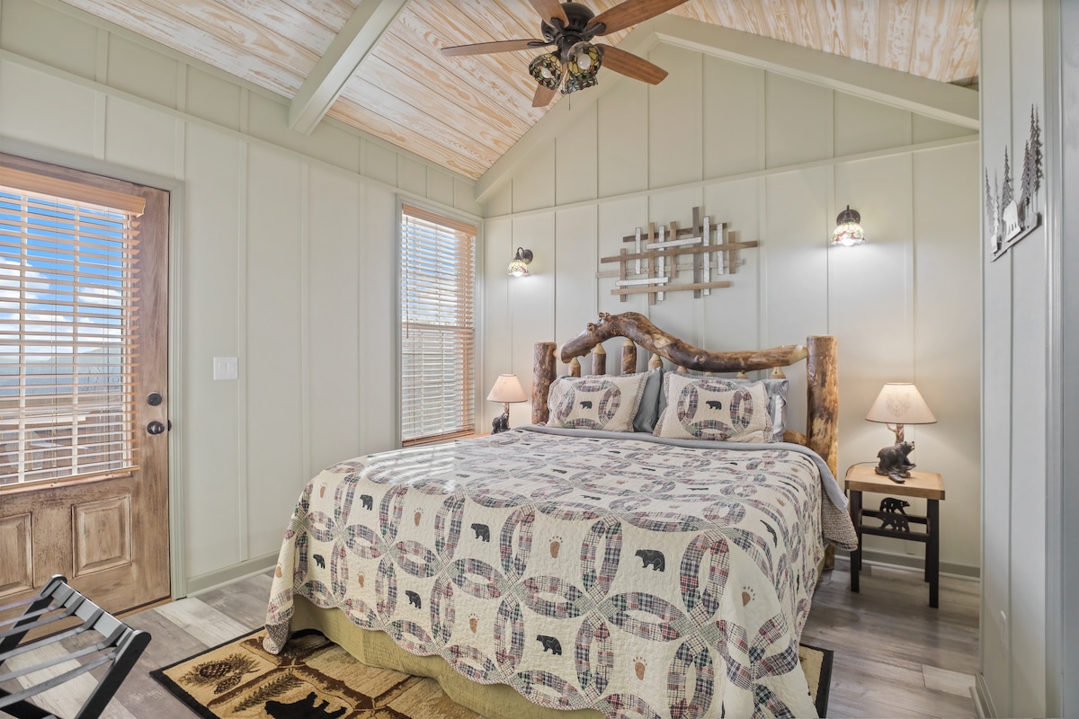 Master bedroom with king size mattress in main section of house