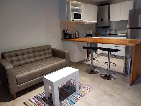 Top Airbnb: Modern loft in a building of unbeatable quality. en Rosario