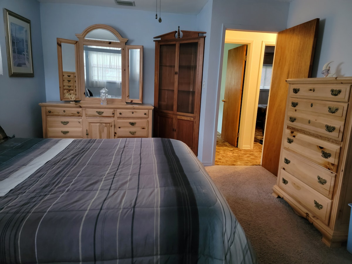 upstairs bedroom with queen bed