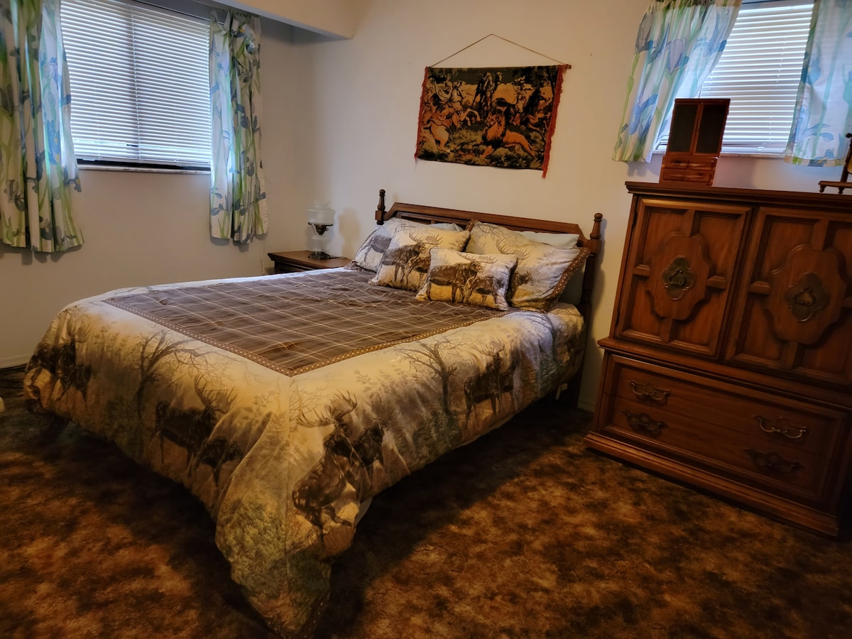 upstairs bedroom with queen bed