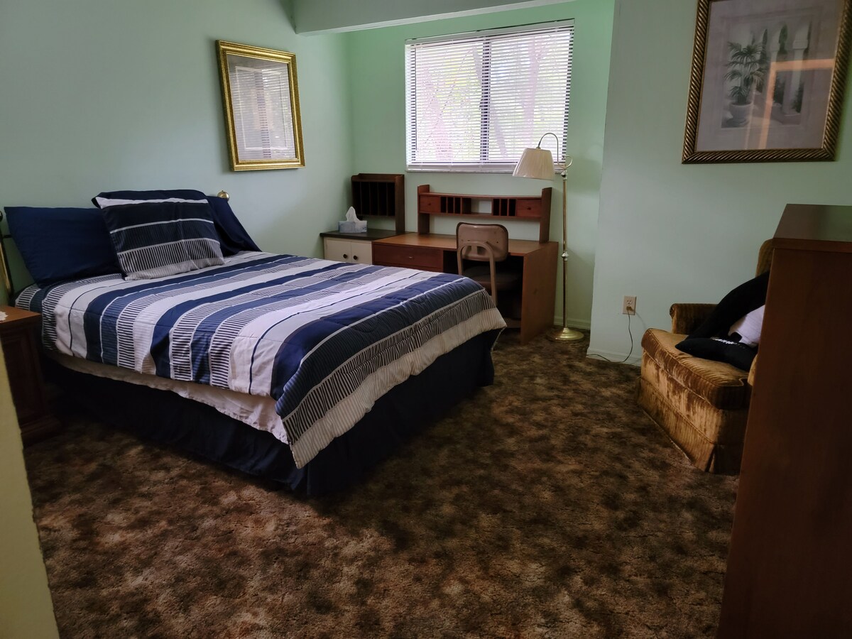 upstairs bedroom with full size bed