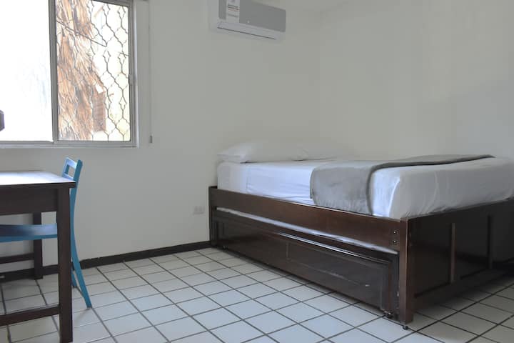 Comfortable and spacious bed.