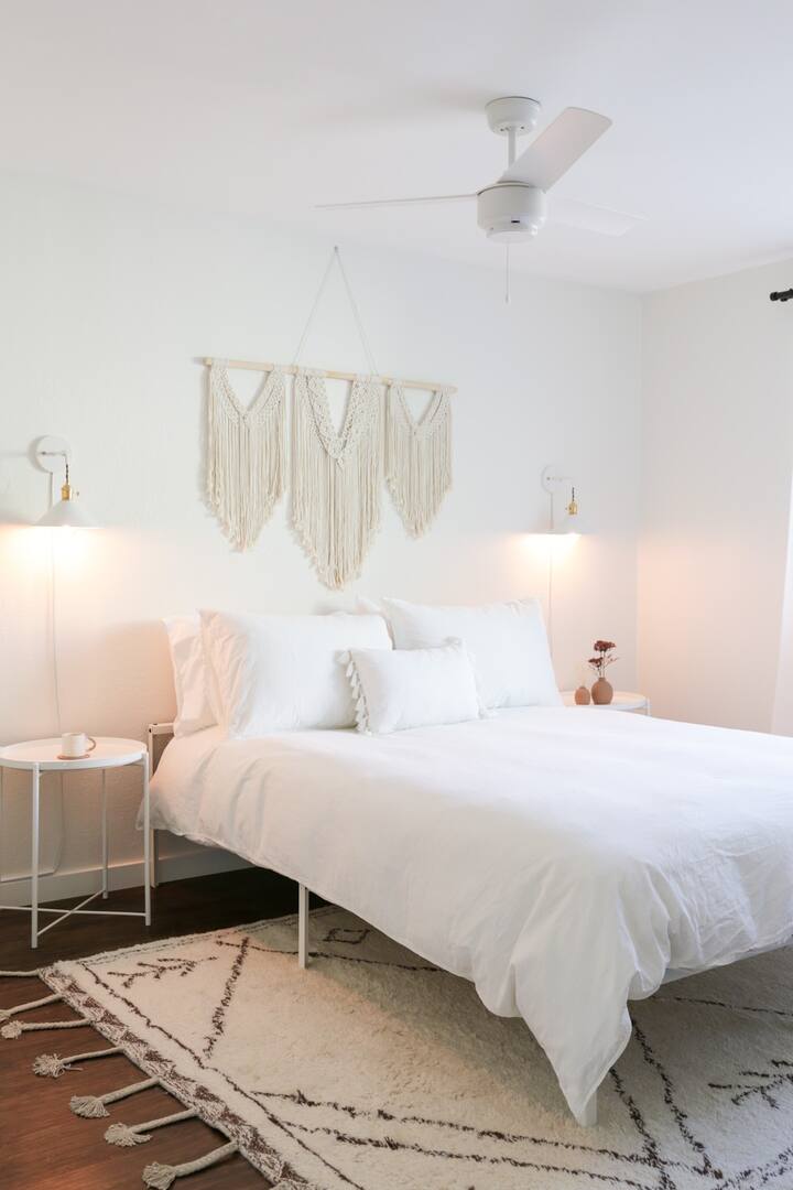 Our large, light-filled guest bedroom is one-of-a-kind with a queen size bed, desk, fastest wifi available and a big, comfortable chair should you need to get work done during your stay. 