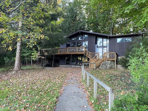 Nestled in the woods & steps from Main St./Beach