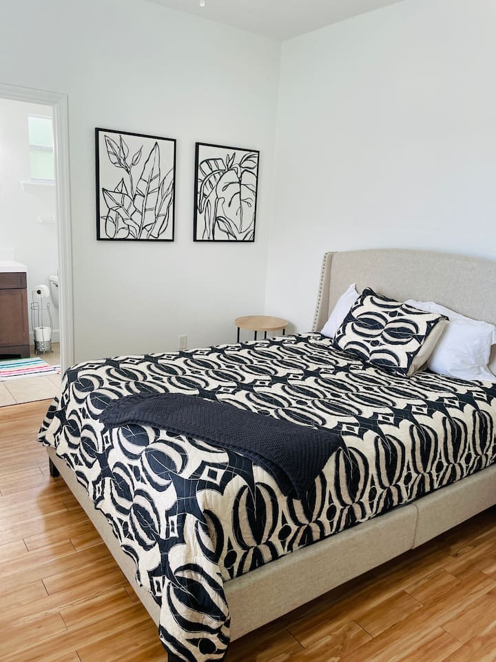 Queen room 2 is located at the back of the house and over looks the pool. It has an attached bathroom.