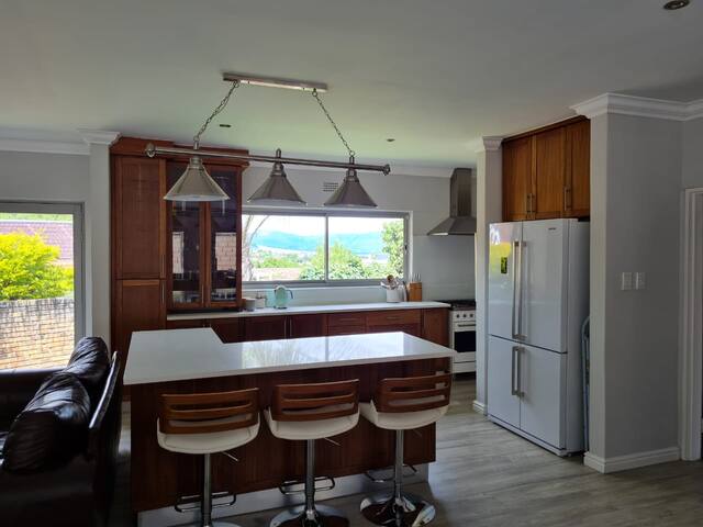 Open plan living with pool and entertainment areas gallery image 5