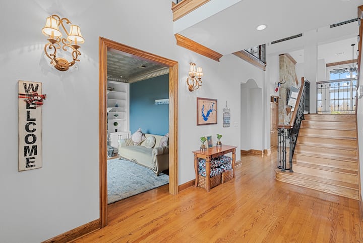 The home features stunning polished wood flooring throughout 