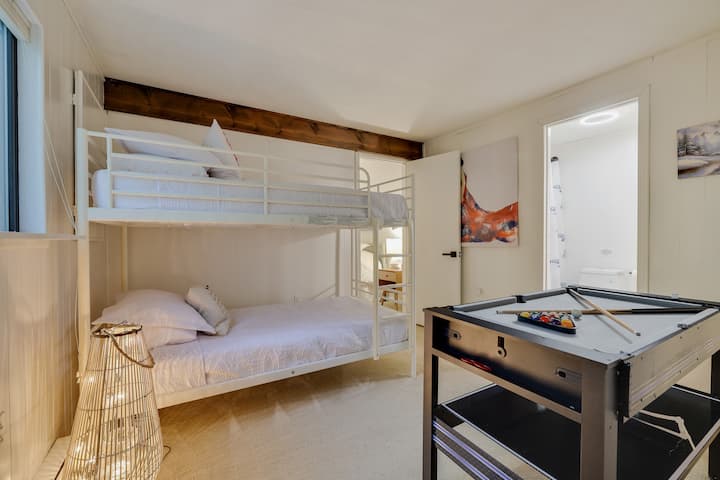 Second Bedroom features a bunk bed with 2 twin beds, small game table (pool, ping pong, air hockey), closet