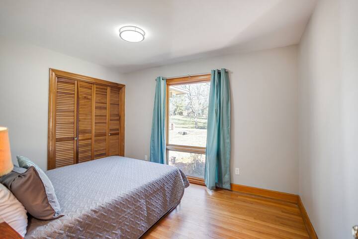 The smallest of four bedrooms has a queen bed and 8-ft closet. 