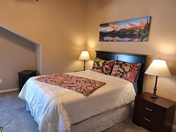 Upstairs queen bedroom with desk area