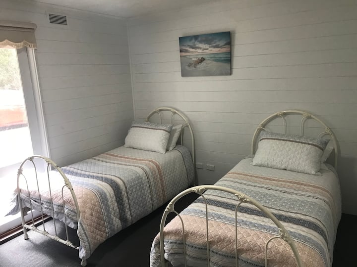 Two single beds for children or adults