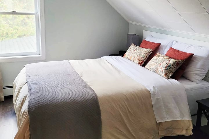 Bedroom #4. Full bed. Touch lamps with USB ports, alarm clock with USB ports, closet, extra sheets/blankets, and hamper.