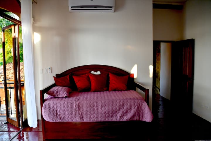 Dual purpose couch and twin sized day bed, complete with pull out twin sized pull out bed and mattress below. Together with the king sized bed, the Master Bedroom comfortably and spaciously nests a family of 4