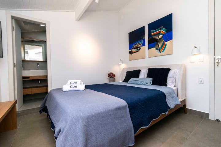 SUITE 4
 Equipped with air conditioning, pillows, and bed and bath linens.