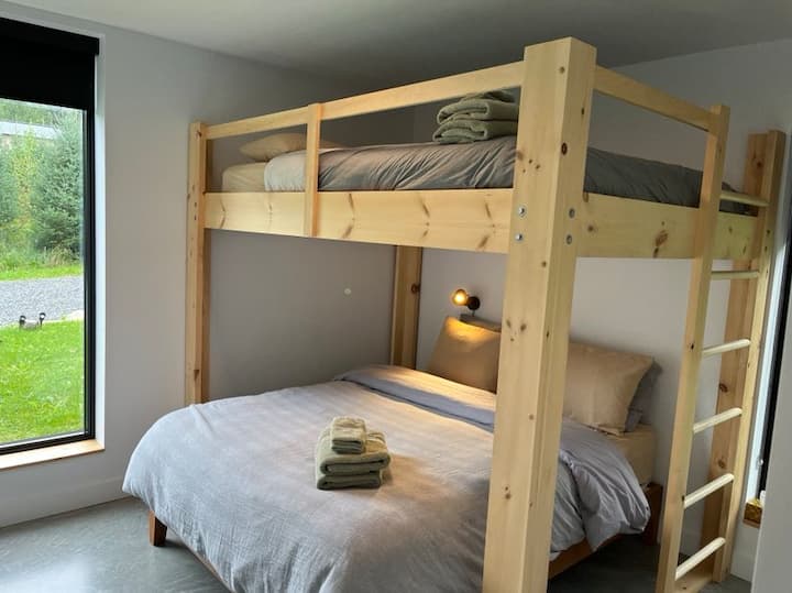 2nd bedroom: This room will be equipped with two queen beds. as well as beautiful large windows with nature views. 