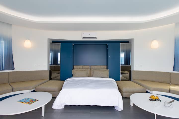 Celestial is the fourth bedroom that is equipped with 50" smart television, small refrigerator and closet. This bedroom is the perfect chill-out spot after swimming  in the pool. 