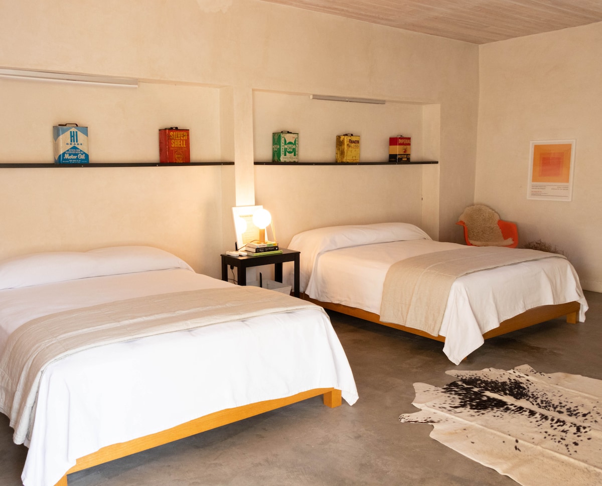 Two queen beds in the detached casita