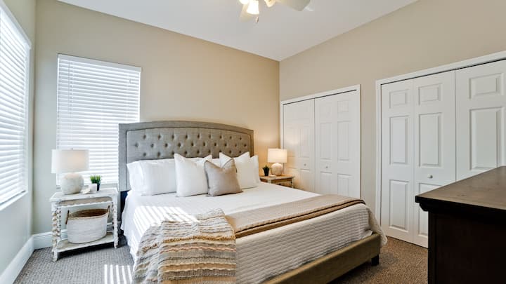 2nd bedroom with king sized bed and smart TV