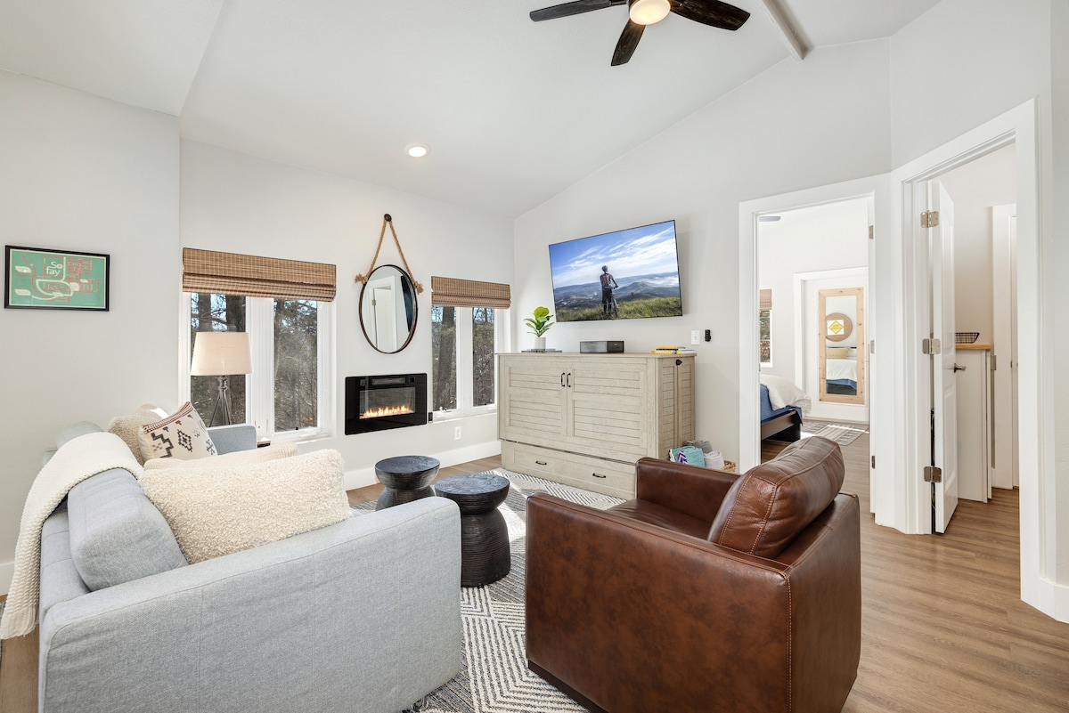 Relax in the living room with electric fire place for those cozy nights in.  Smart TV available to login into your favorite streaming services. 