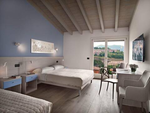 Camera tripla deluxe nel Residence caffe maya