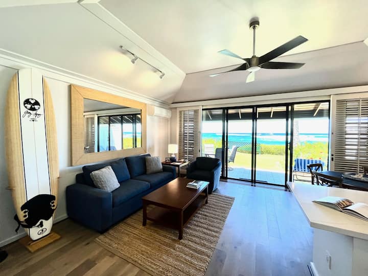 Catch some waves on our surfboard (note: the 8 foot board in the photo has been replaced by a 9 foot board)