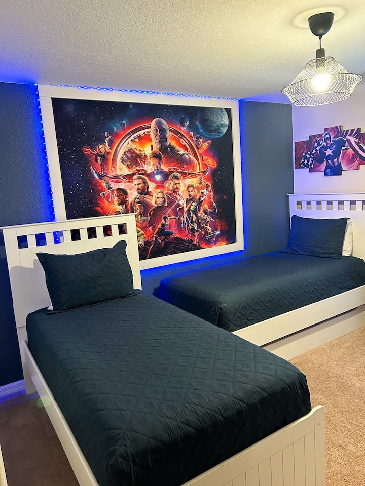 2nd Floor- Step into action-packed excitement as you enter this dynamic space designed for fans of all ages. The room features two twin beds and an additional twin trundle bed, providing ample sleeping space for your young superheroes.