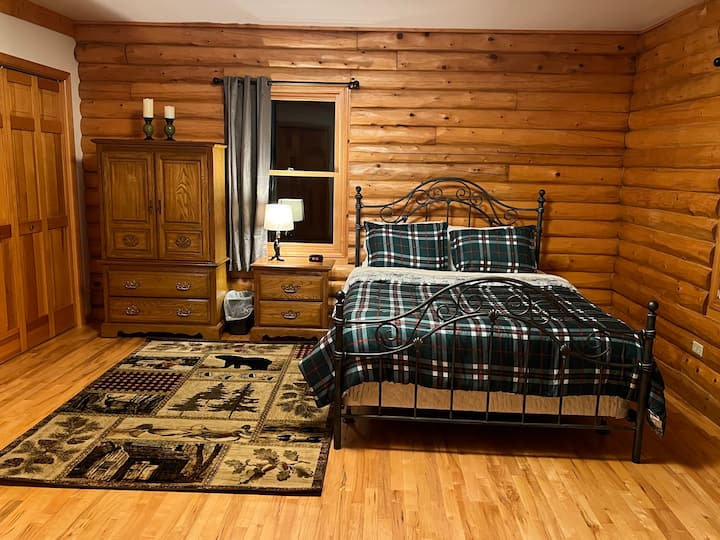 Bedroom that features a Queen size bed, 2 full closets and Cable TV.  Located on main level. 
