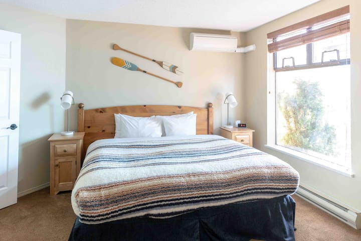 King bed in spacious primary bedroom 