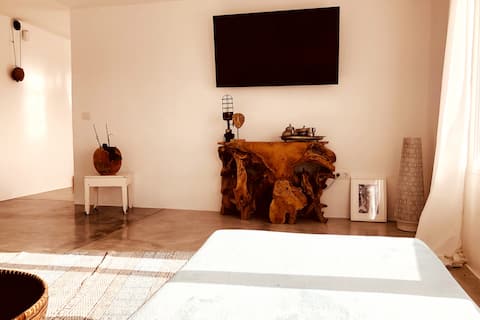 Successful Airbnb property: Modern hippie apartment with a WOW view & pool in Tinajo