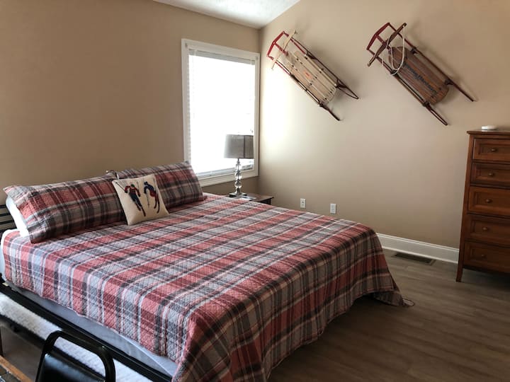“Snow Sports Suite” - 2nd level Master bedroom with private full bath. King sized bed with new memory foam mattress and two pull-out twin trundles (need to move night stands), both with new memory foam mattresses. Gas fireplace. 