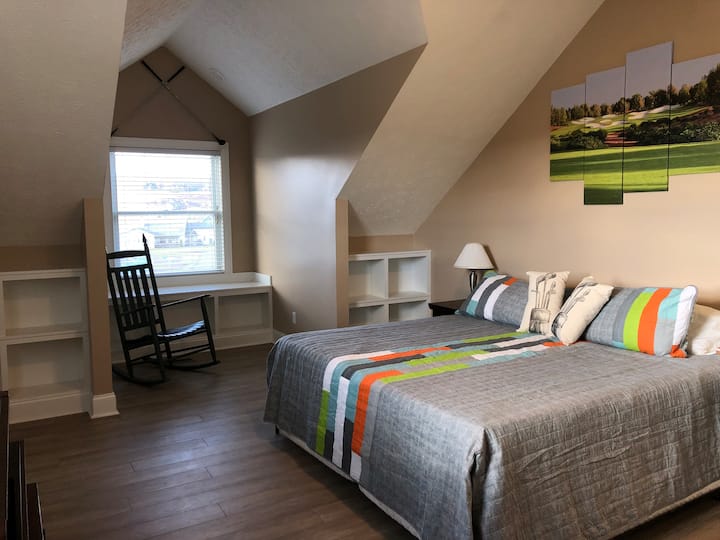 “Golf Suite” 2nd level bedroom with private full bath with shower stall. King sized bed with new memory foam mattress and two pull-out twin trundles (need to move night stands), both with new memory foam mattresses.