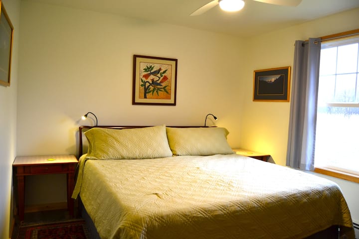 Bedroom #1 - King Size Henkel Harris bed w/Tempur-pedic mattress, individual reading lights,flannel sheets, down comforter, ceiling fan, hand-knotted rugs, teak side tables, room darkening drapes, luggage racks, antique dresser, & clothing peg boards