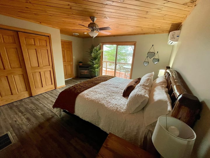 Master bedroom’s adjustable king bed, fireplace, & amazing view!