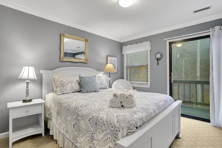 Bedroom #3: Blue bedroom with a queen bed and your own balcony.