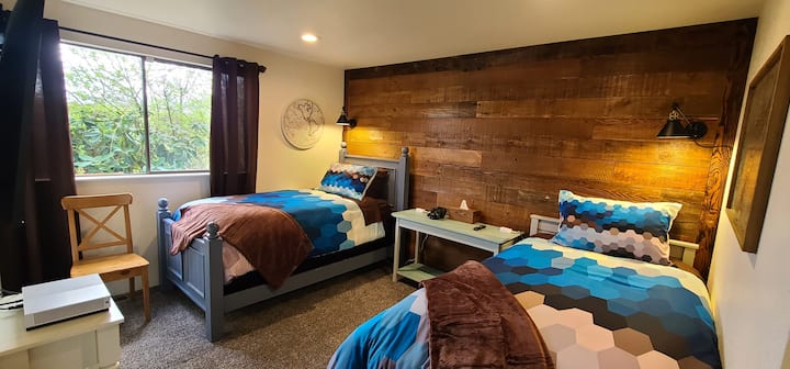 The twin room has a big screen tv with an Xbox One gaming system