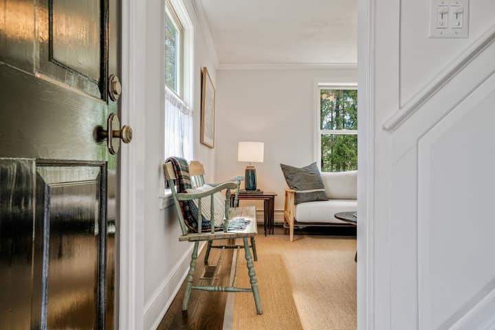 The den rests right off the entrance and staircase to the guest bedrooms. 