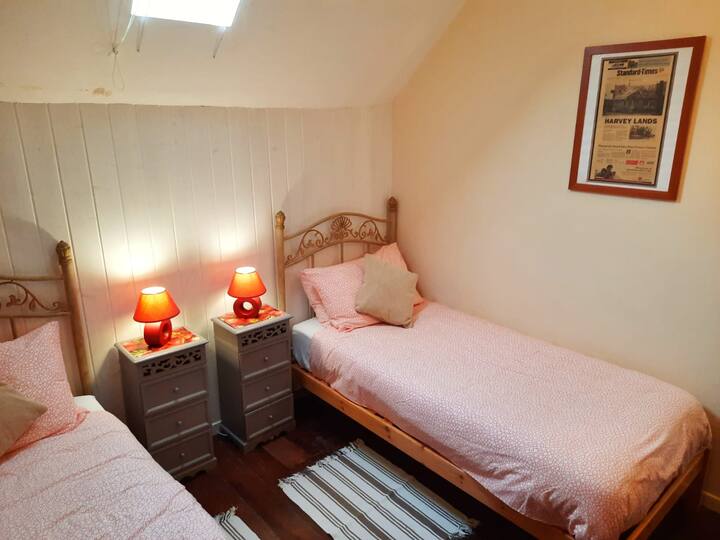 More comfortable beds to try. This bedroom offers two single beds which can also be converted to a double bed if required, with plenty of storage including a wardrobe and draws. All bedrooms include a fan and heater depending on the time of year.