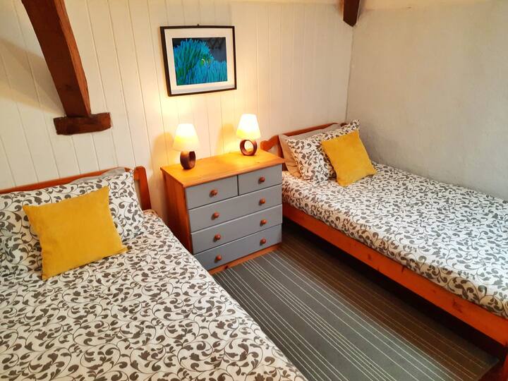 Plenty of space to sleep and play. This bedroom offers two single beds with plenty of storage including a wardrobe and draws. All bedrooms include a fan and heater depending on the time of year.
