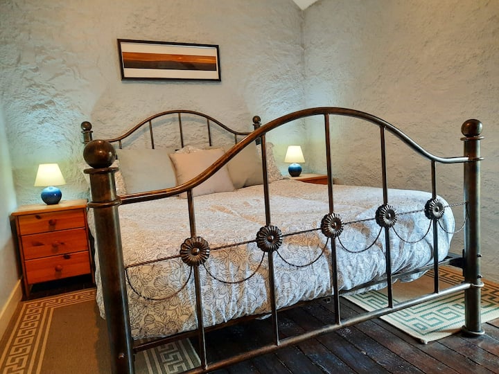 After a hard day's relaxation have a great night's sleep on our extremely comfortable beds. This double room offers stunning views over the countryside and pool.