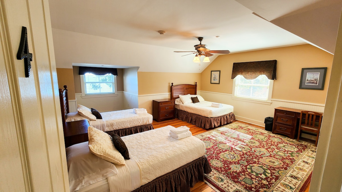 Main House - 2nd Floor - Bedroom #4
Two twin beds, double bed, two small dressers, small desk and closet.
Bathroom is shared between three upstairs bedrooms.