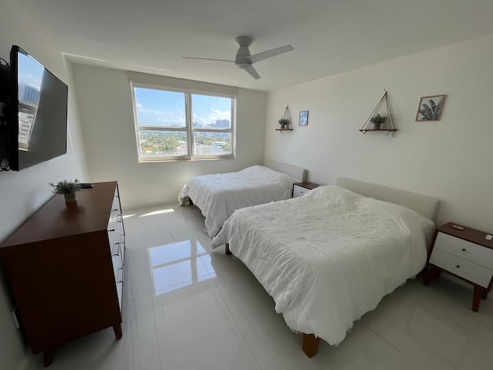 Second suite with two full size beds and walk in closet.