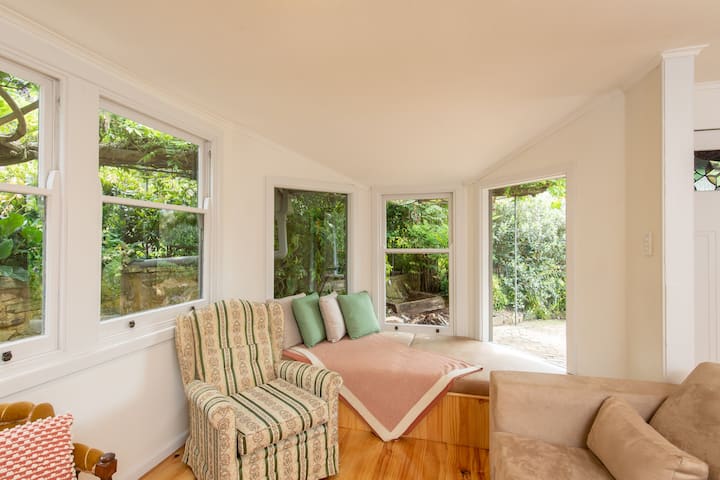 The day bed is the perfect place to sit back and relax with your choice of beverage. Look out the window at the water feature in the front garden and the seasonal flowers and plants. 